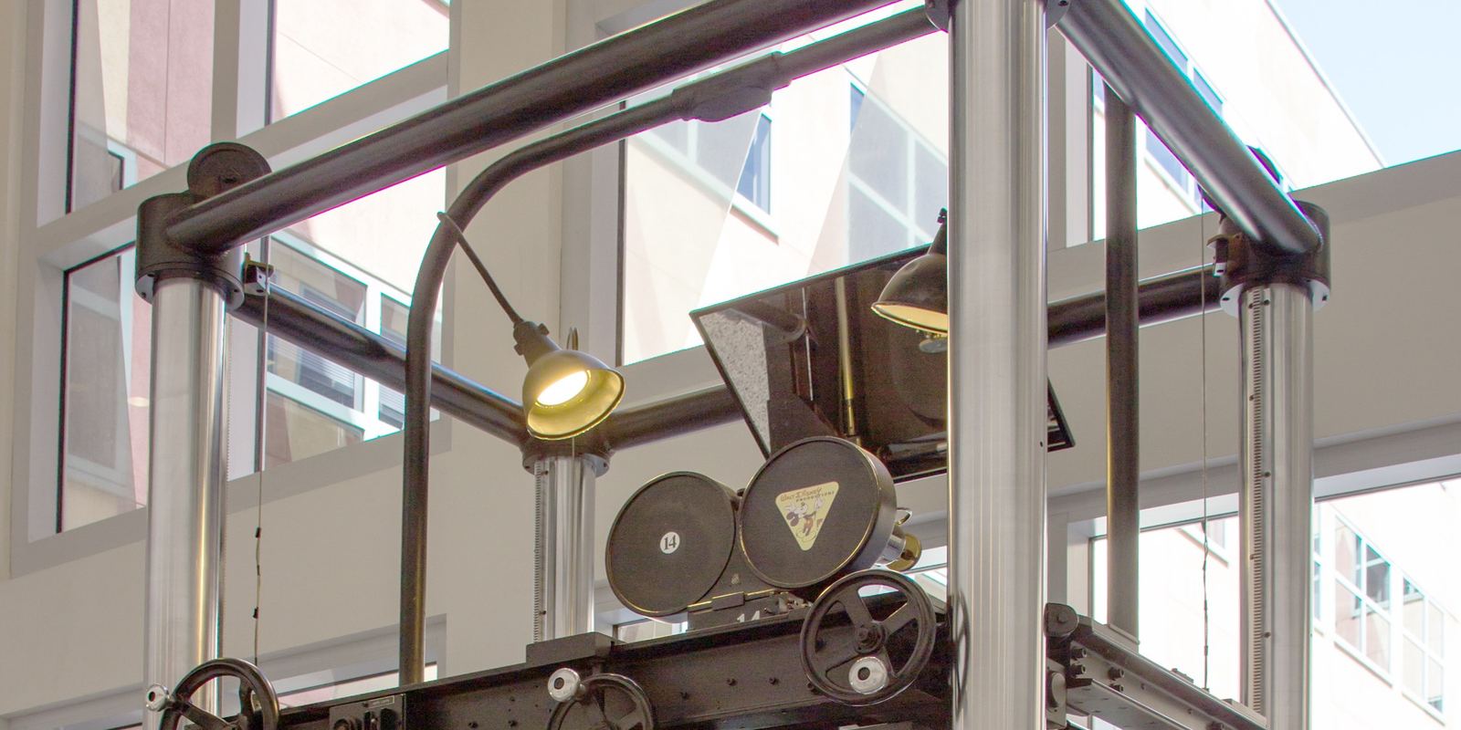A tall Disney multiplane camera stand from 1937 on display in a museum